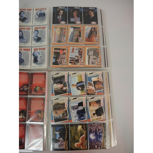 398 - Ten albums of Inkworks trading cards, including Hellboy, Small Soldiers, Men In Black, etc.