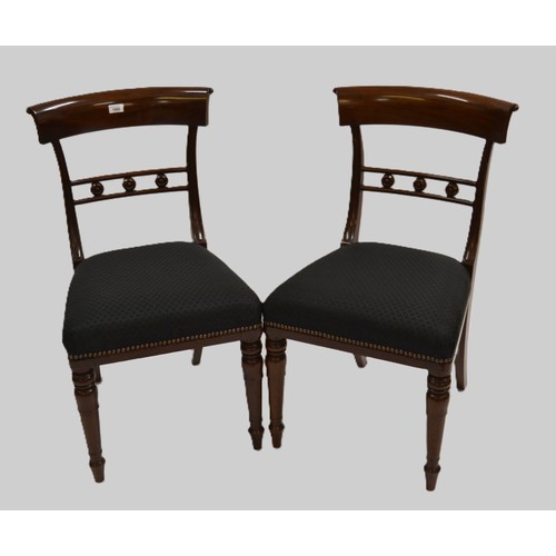 1980 - Set of twelve William IV mahogany dining chairs, the rail backs above black damask upholstered seats... 