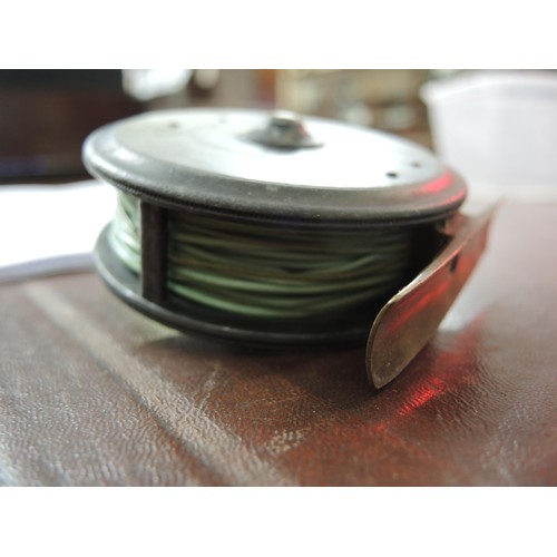 126 - Hardy Uniqua 3in fly fishing reel with ivorine handle, together with another fishing reel, ' The Cli... 