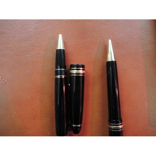 358 - Montblanc ballpoint pen (cartridge lacking) and pencil in original leather case