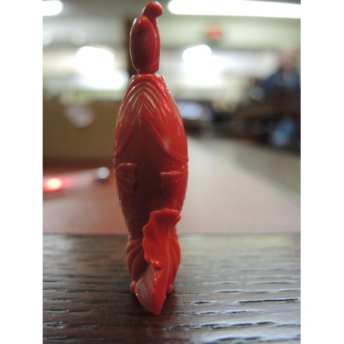 461 - Chinese red carved jade snuff bottle, in the form of a fish, with stopper, 60mm long including stopp... 