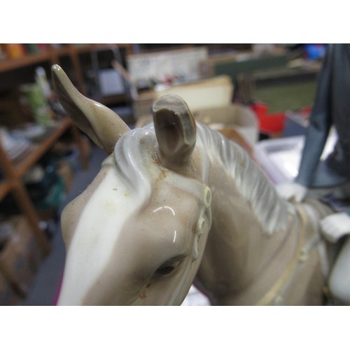 516 - Large Lladro model of a veteran motor car parked beside a figure riding a horse, 50cm wide overall a... 