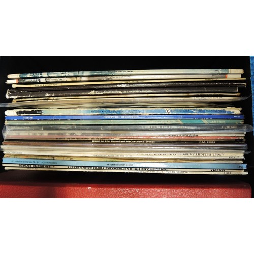 169 - Six cases containing a collection of vinyl LP records, mainly 1970's and 80's, various artists