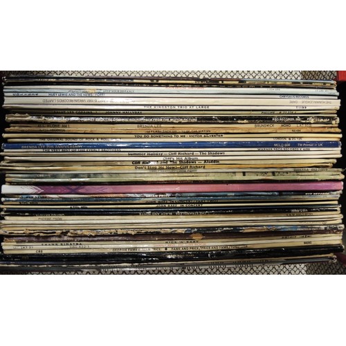 169 - Six cases containing a collection of vinyl LP records, mainly 1970's and 80's, various artists