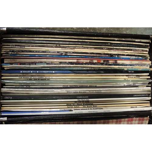 169 - Six cases containing a collection of vinyl LP records, mainly 1970's and 80's, various artists