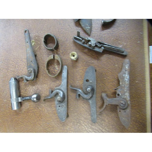 267 - Large quantity of antique and later flintlock and percussion, pistol and rifle spares, including sto... 