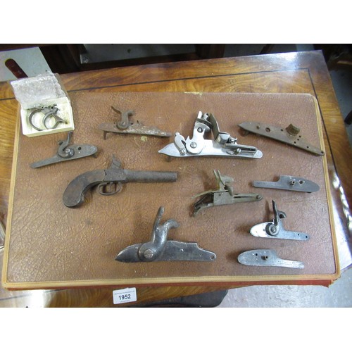 267 - Large quantity of antique and later flintlock and percussion, pistol and rifle spares, including sto... 