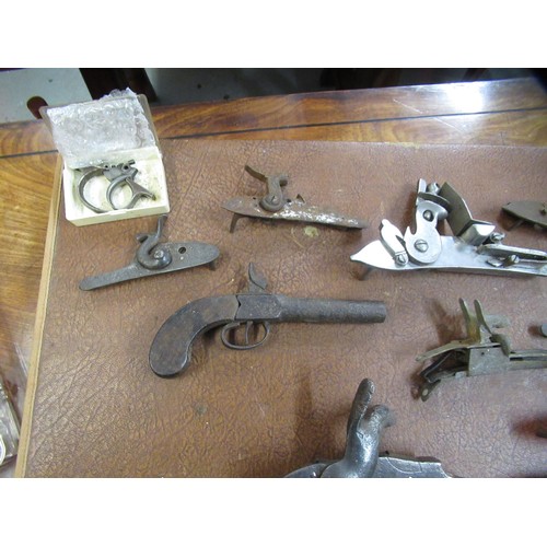 267 - Large quantity of antique and later flintlock and percussion, pistol and rifle spares, including sto... 