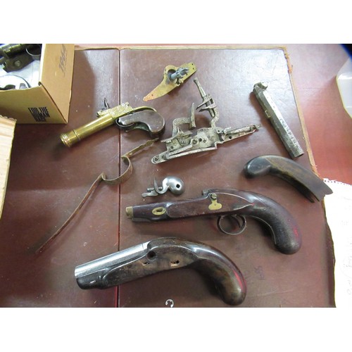 267 - Large quantity of antique and later flintlock and percussion, pistol and rifle spares, including sto... 