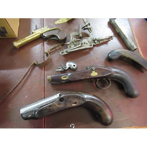 267 - Large quantity of antique and later flintlock and percussion, pistol and rifle spares, including sto... 