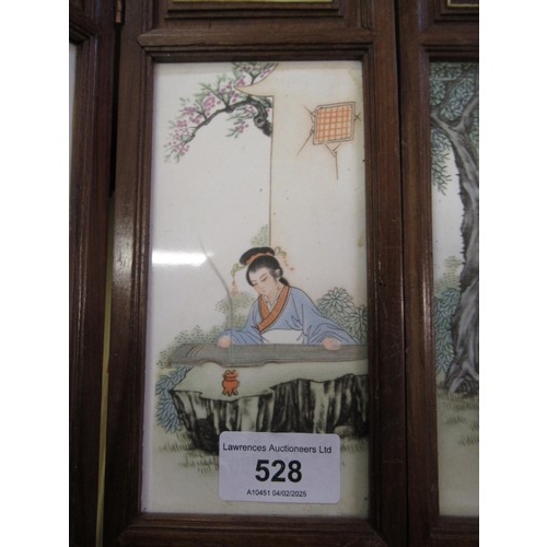 528 - Modern Chinese miniature wooden framed four fold screen having porcelain panels, decorated with figu... 