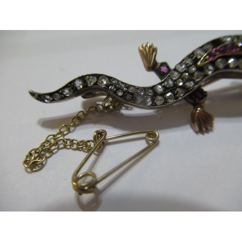 1001 - Unmarked yellow and white metal lizard brooch set rose cut diamonds and pink rubies, 5.5cm long, 6.5... 