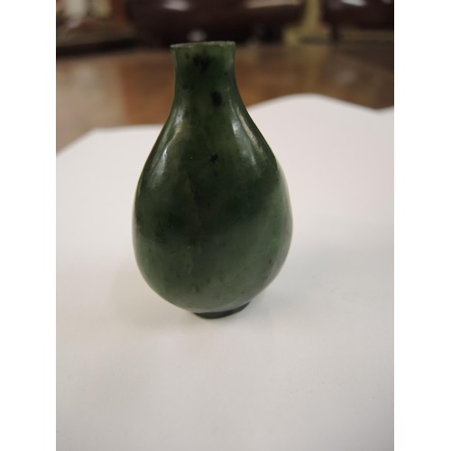 459 - Chinese dark green jade snuff bottle with stopper, 67mm high including stopper