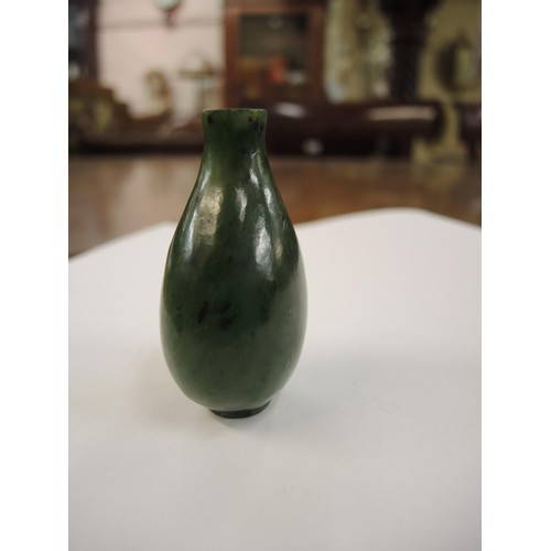 459 - Chinese dark green jade snuff bottle with stopper, 67mm high including stopper