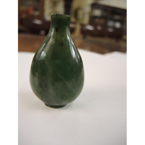 459 - Chinese dark green jade snuff bottle with stopper, 67mm high including stopper