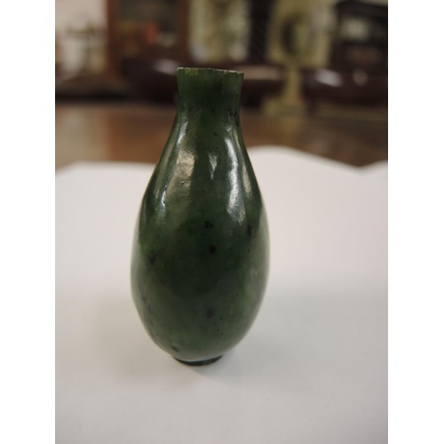 459 - Chinese dark green jade snuff bottle with stopper, 67mm high including stopper