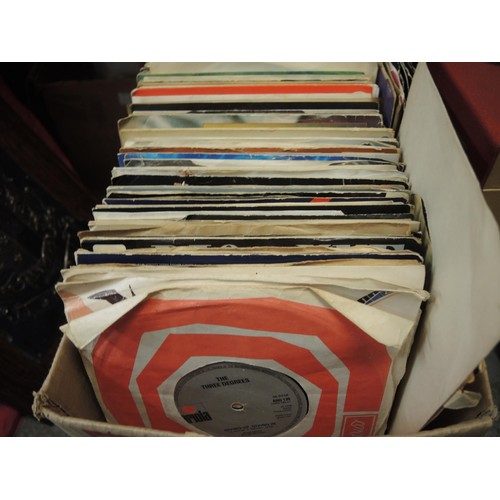 151 - Large collection in seven containers of various 45rpm records and a quantity of LP's