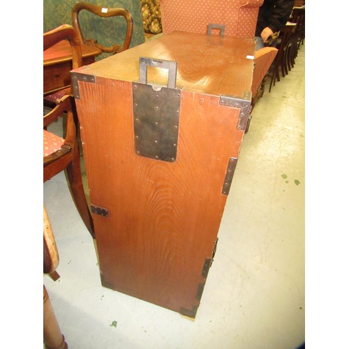 1962 - Japanese elm side cabinet, having iron mounts and handles, with arrangement of various drawers and s... 