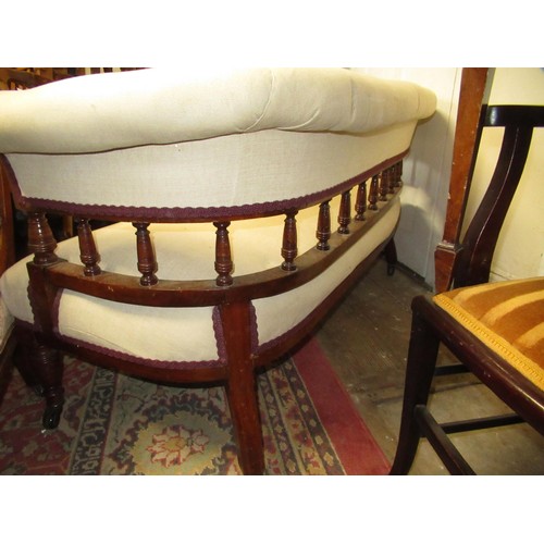 1967 - Edwardian walnut drawing room sofa, with beige linen upholstery, on turned supports with casters