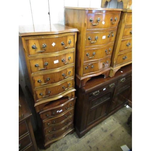 1527 - Pair of reproduction yew wood serpentine fronted four drawer bedroom chests, together with another s... 