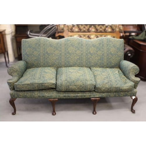 1530 - Green brocade upholstered triple humpback sofa in Georgian style, with shaped arms, raised on cabrio... 