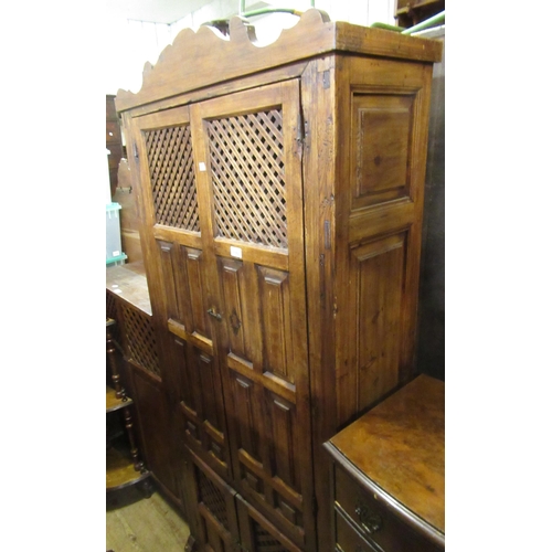 1782 - Spanish stained pine cabinet with two panelled and fretted doors, 83cm wide x 33cm deep x 189cm high... 