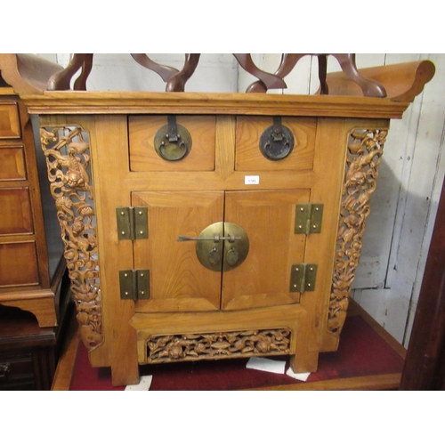 1785 - Chinese elm altar table, having two drawers and two panelled doors with carved pierced decoration, 1... 