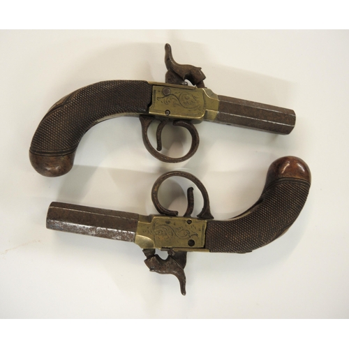 192 - Pair of early 19th Century percussion pocket pistols with octagonal screw off barrels