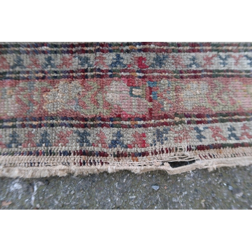 20 - Antique Turkish prayer rug with a mihrab design in shades of rose, ivory and yellow with multiple bo... 