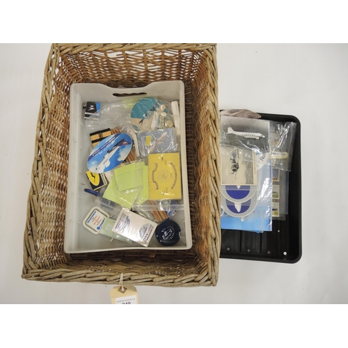 240 - Basket containing two trays of aviation related stickers, cards, badges and ephemera, together with ... 