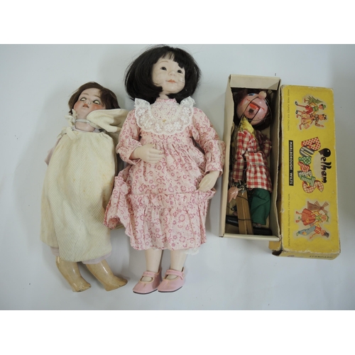 247 - Simon and Halbig Geran bisque headed doll, together with a Pelham puppet and a modern bisque headded... 