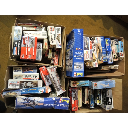 285 - Four boxes containing a collection of unbuilt model aircraft kits including Revel, Tamier etc