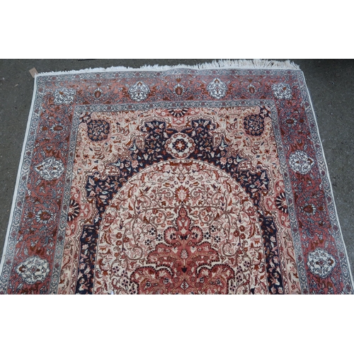 3 - Turkish Persian pattern rug of medallion design on a beige ground, 237 x 140cm