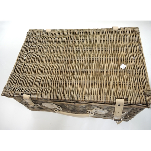 313 - Amboyna casket in the form of books, together with a wicker picnic basket