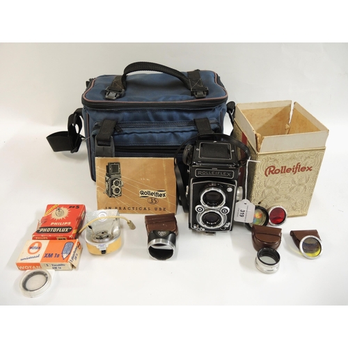 319 - Rolleiflex 3.5A film camera serial no. 1275786, having original box and handbook with accessories