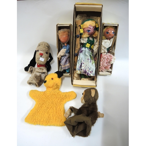 330 - Three glove puppets, Chad Valley figure of Sweep, another of Sooty and another of a monkey, together... 