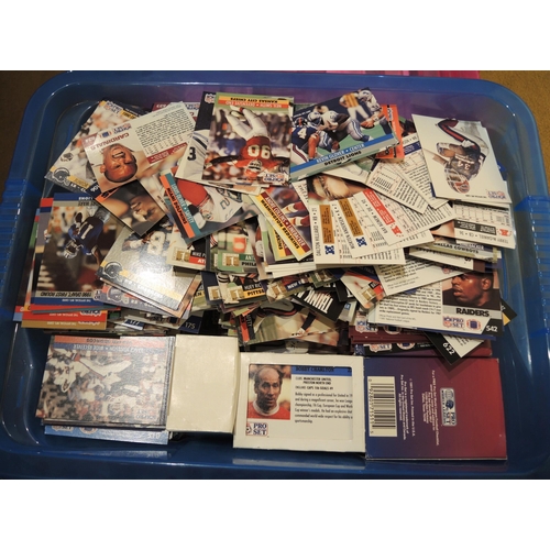 369 - Three boxes containing NFL Pro set cards, Hannah Montana, Terminator 2 and Erotica sets etc.