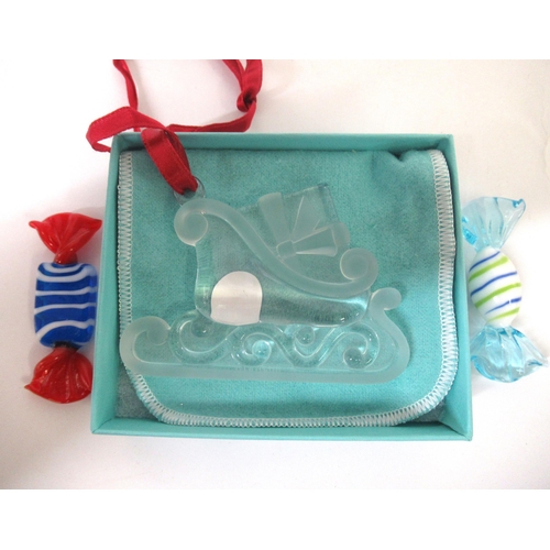 439 - Tiffany & Co glass Christmas tree decoration in original box, together with two Murano glass sweets