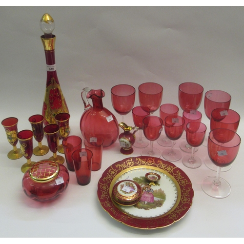 450 - Quantity of Cranberry glass wine glasses, goblets, cups, water jug etc., together with a Venetian re... 