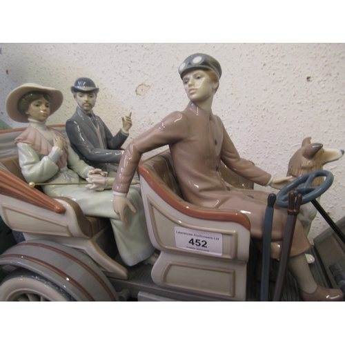 452 - Large Lladro model of a veteran car with driver, passengers and dog on original wooden base, 65cm wi... 