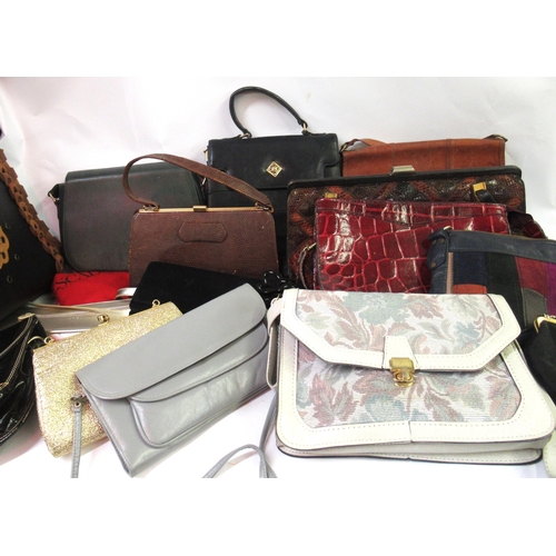 46 - Three boxes containing a large collection of various ladies handbags etc.