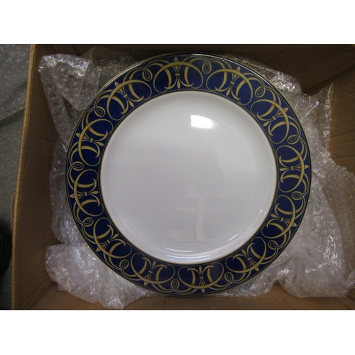 493 - Set of ten Spanish porcelain dinner plates, together with a quantity of glass decanters