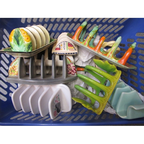 496 - Quantity of various toast racks including Poole Pottery and Carlton Ware