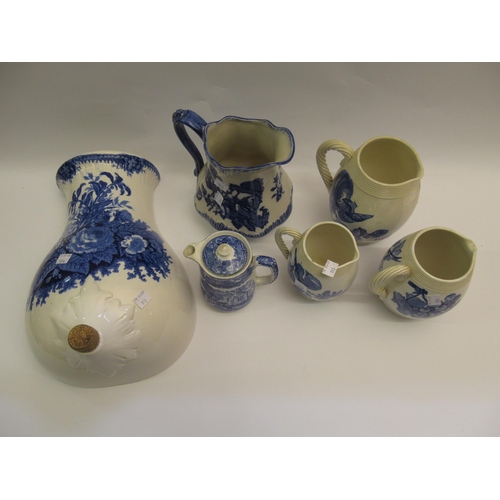 513 - Graduated set of three 19th Century blue and white transfer printed jugs together with a Ringtons po... 