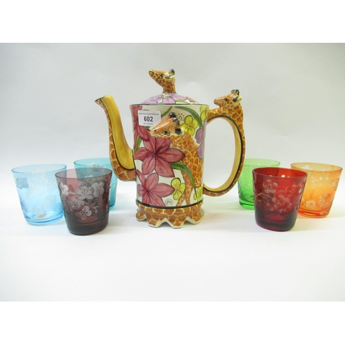 602 - Set of six etched coloured glass beakers, together with a pottery Giraffe teapot