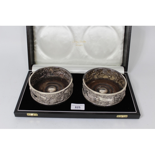 625 - Pair of cased modern silver bottle coasters with turned mahogany bases