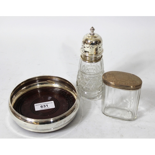 631 - Modern silver mounted bottle coaster, silver mounted cut glass sugar caster, and a silver mounted gl... 