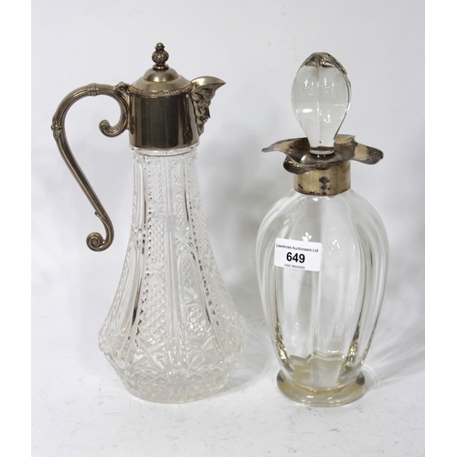 649 - Blown glass decanter with silver collar together with a glass claret jug with plated mounts