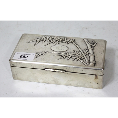 652 - Japanese rectangular silver cigarette box, the cover embossed with bamboo design, 17 x 9 x 5cm high