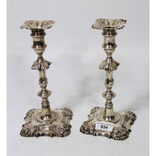 654 - Near pair of Georgian silver candlesticks, 22cm high, 30oz t